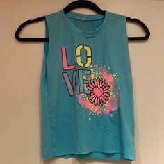 Rock Candy Turquoise Tank. Nwt. Never Worn. Size Small Blue Graphic Print Tank Top For Spring, Spring Blue Graphic Print Tank Top, Fun Blue Tank Top For Summer, Blue Playful Tank Top, Playful Blue Sleeveless Tank Top, Blue Sleeveless T-shirt With Graphic Print, Blue Fun Spring Tops, Fun Blue Spring Top, Fun Blue Spring Tops