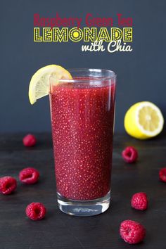 raspberry lemonade smoothie with chia in a glass next to fresh raspberries