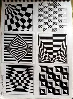 some black and white designs on a piece of paper