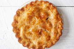 a pie sitting on top of a white table