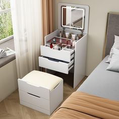 a bedroom with a bed, dresser and mirror on the wall next to a window