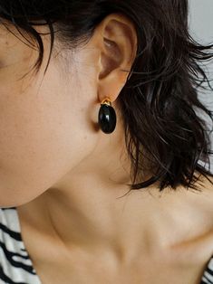 Indulge in the irresistible charm of our Black Onyx Moon Huggie Earrings! Crafted with sleek black onyx stones set in a moon-shaped huggie design, these earrings will add a touch of elegance and mystique to any outfit. Elevate your style and enchant those around you with these stunning earrings. Metal:Metal: 18K Recycled Gold Plated Vermeil on Recycled Sterling Silver/Recycled Sterling Silver Gemstones:Black Onyx Dimensions: length 27mm Weight: 8g each Black Hoop Earrings For Everyday, Black Everyday Hoop Earrings, Everyday Black Hoop Earrings, Chic Black Round Earrings, Minimalist Tarnish Resistant Black Earrings, Minimalist Black Tarnish Resistant Earrings, Elegant Black Everyday Earrings, Classic Small Hoop Earrings In Black, Chic Black Earrings With Black Enamel