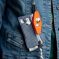 Adapted from classic hotel - motel key tags, these vintage-inspired keychains are adorned with a loving touch of Snoopy nostalgia. • Officially Licensed Product of Peanuts© • 3.5” x 1.75" • Orange Keychain with Double-Sided Imprint • Split Ring Keyring Snoopy Keychain, Orange Keychain, Motel Key, Four X, Lanyard Wallet, Classic Hotel, Touch Love, Candle Cards, Felt Pennants