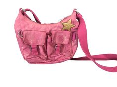 A metalized pink crossbody bag by Kipling.  Dimensions: Height 11.5cm, Length 19.5cm, and 5cm width.   It is in good condition. Please see photos.  It will be shipped with registered mail.  Please note that we accept returns and exchanges however it is best to check out all the information provided for the item to avoid them.  Returns from outside the European Union have high taxation fees for the seller and therefore we wish to provide you with any additional information you need before purchas Cross Body Bag, Gucci Sweatshirt, Short Green Dress, Kipling Bags, Pink Crossbody Bag, Vintage Turquoise, Cute Bags, Small Bag, Baby Bag