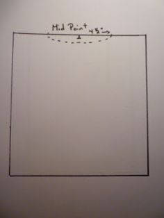 a drawing of a square in the middle of a wall with writing on it that says mid point