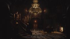 a dimly lit room with chandelier and stairs