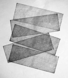 three pieces of paper that have been folded together