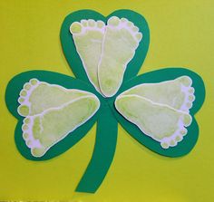 a four leaf clover cut out from green paper