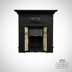 a black fireplace with ornate designs on the front and side panels, in an antique style