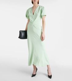 Gathered midi dress in green - Victoria Beckham | Mytheresa Ruched Maxi Dress For Work, Chic Midi Dress For Cocktail, Ruched Midi Dress For Daywear, Chic Ruched Midi Dress For Work, Casual Evening Maxi Dress In Viscose, Casual Viscose Maxi Dress For Evening, Silk Midi Dress With Short Sleeves For Daywear, Chic Viscose Dress For Date Night, Silk Short Sleeve Midi Dress For Work