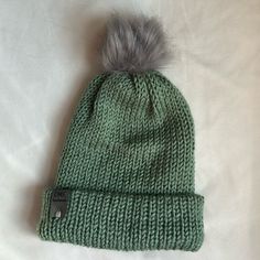 Brand New, Never Worn, Handmade Winter Beanie With Pom-Pom. The Brim Can Be Folded Down For A More Slouchy Look. This Hat Is A Pretty Green Color And Made With A Very Soft Acrylic Yarn. Hat Is Machine Washable, Lay Flat To Dry. The Pom-Pom Can Be Fluffed Up Again With A Hairdryer! Green Knitted Winter Hat, Casual Green Bonnet For Winter, Green Casual Winter Bonnet, Casual Green Winter Bonnet, Winter Soft Knit Green Hat, Green Soft Knit Winter Hat, Winter Green Soft Knit Hat, Cozy Green Hat For Fall, Cozy Green Winter Hat