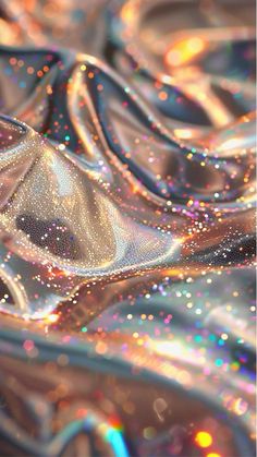 a close up view of shiny material with bubbles and sparkles on the surface, as well as an abstract background