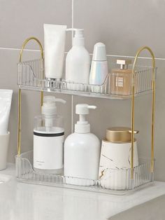 two tiered bathroom shelf with soap and lotion