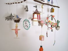 a mobile made out of toys hanging from the ceiling