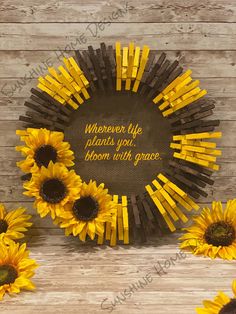 sunflowers are arranged around a plaque that says, wherever life begins you're bloom with grace