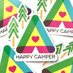 happy camper stickers on top of each other