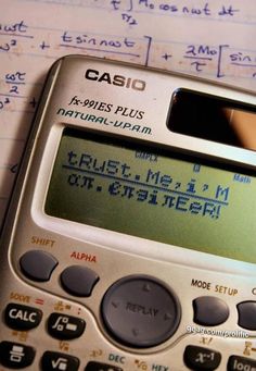 a calculator sitting on top of a piece of paper