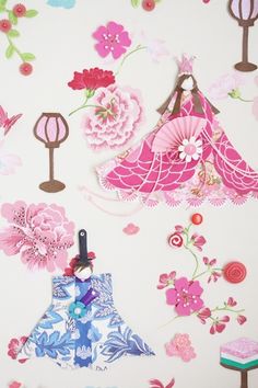 an image of a wall with flowers and umbrellas on it's side as well as other items