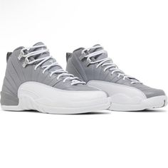 Nwt Air Jordan 12 Retro (Gs) Stealth White Cool Grey. Size 6 Big Kids But Will Fit An 8 In Women’s. Bought Them And Never Used Them. Jordan 12 Gray And White, Gray Jordan Sports Shoes, Sports Jordan Shoes In Gray With Branded Insole, Gray Sporty Custom Sneakers For Light Sports, Sporty Gray Custom Sneakers For Light Sports, Gray Lace-up Jordan Sports Shoes, Jordan Shoes With Air Cushioning For Light Sports, Sporty Jordan Shoes With Air Cushioning And White Sole, Gray Jordan Shoes For Light Sports With Round Toe