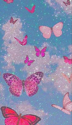 pink butterflies flying in the sky with stars and sparkles on it's wings