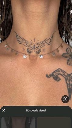 an image of a woman with tattoos on her chest