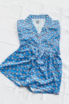 Our luxuriously soft Evil Eye Pajamas are perfect for weddings, bridal parties, holidays, getaways, bachelorette weekends, vacations, or just lounging at home. Features a button front shirt and elastic waist bottoms. Shorts feature hidden pockets. These pajamas are in production and require 5-6 weeks before shipment.