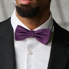 This purple bow tie comes pre-tied, so all you have to do is find the perfect shirt to wear with it. Royally stylish, this bow tie is crafted from lustrous silk twill and features an adjustable strap and secure hook fastener. Designed by Bohemian Revolt in Denmark. Gift box provided. Fitted Purple Suit And Tie Accessories For Party, Formal Purple Tie, Purple Bow Tie For Party, Purple Party Bow Tie, Elegant Purple Bow Tie For Party, Fitted Business Ties With Butterfly Knot, Adjustable Satin Bow Tie For Business, Purple Suit And Tie Accessories For Black Tie Events, Classic Purple Adjustable Suit And Tie Accessories