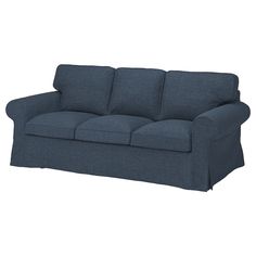 a blue couch sitting on top of a white floor