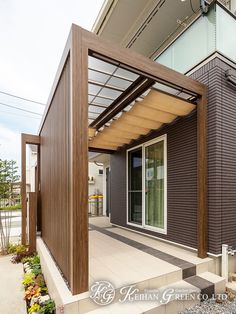 an outdoor covered patio with steps leading up to it