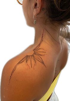 a woman with a tattoo on her back