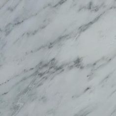 the marble is white and grey in color