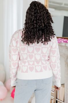 Details Pink checkered heart sweater Fabric has stretch, relaxed fit, mid weight V-neckline with long sleeves, checkered contrasting heart design, and ribbed hem detailing Pair this sweater with jeans and match with your mini! Unlined Size small from shoulder to hem: 23" Material and Care 50% viscose, 28% polyester, and 22% nylon Hand wash, dry flat Patterns may vary Materials may have natural variations Colors may vary from different viewing devices. Sweater With Jeans, Pink Checkered, Sweater Fabric, Distressed Mom Jeans, Jean Harlow, Loving You, Heart Sweater, Flats Patterns, Pink Lily