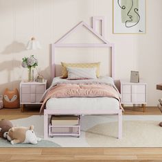 a bedroom with pink walls and furniture in the corner, including a white bed frame