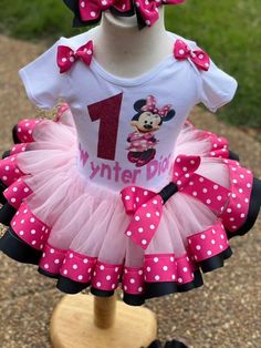 Make your little one's special moments even more magical with our Custom Tulle Ribbon Trim Tutu Set, perfect for toddlers and girls. This charming set includes a fluffy tutu skirt with a beautiful ribbon trim and a matching top, designed to create unforgettable memories at birthdays, dress-up parties, and other special occasions. Made from soft, high-quality materials, this tutu set is comfortable and gentle on delicate skin, ensuring hours of joyful play and celebration. Features: Charming Design: This tutu set features a beautiful tulle skirt with a ribbon trim and comes in various colors to suit any theme or occasion. Comfortable Fit: Crafted with soft, stretchy fabric, the tutu and top offer a snug yet comfortable fit, allowing for easy movement. High-Quality Materials: Made from durab Cute Pink Tutu Dress For Birthday, Custom Minnie Mouse Birthday Outfit, Cute Minnie Mouse Top For Birthday, Mini Mouse Tutu, Crochet Mini Mouse Tutu Dress, Cute Pink Tutu Dress For First Birthday, Minnie Mouse Tutu Dress Pink, Minnie Mouse Tutu, Ribbon Trim Tutu