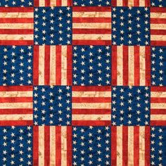 an american flag quilt with red, white and blue stars