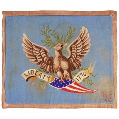 an embroidered flag with the words liberty inc on it and an eagle in the center