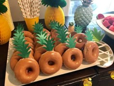 there are many donuts with pineapples on the top and one in the middle