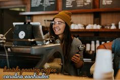 two women sitting at a coffee shop smiling