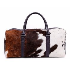 cowhide duffel bag | Cowhide Bag | mens backpacks and duffels | duffle bag This cowhide leather duffle bag is made of high-quality genuine cowhide leather, which is soft, durable, and comfortable to touch. The hair-on hide leather design adds a touch of luxury to the bag, making it suitable for both men and women. The spacious main compartment of the bag can hold a variety of items, such as clothes, shoes, toiletries, and travel accessories. The multiple pockets and compartments of the bag provi Leather Gym Bag, Mens Backpacks, Pink Studio, Dream Wishlist, Cowhide Bag, Travel Duffle Bag, Leather Duffle Bag, Leather Duffle, Travel Duffle