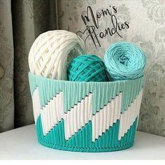 two balls of yarn are in a basket