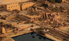 an aerial view of the ancient city of palmyran in egypt, with water and buildings