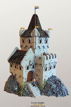 a castle made out of legos on top of a hill