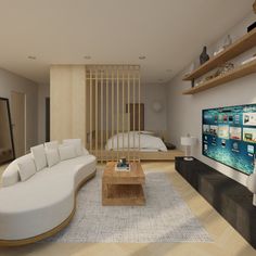 a living room filled with furniture and a flat screen tv on top of a wooden shelf