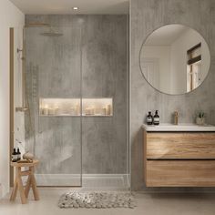 a bathroom with a sink, mirror and bathtub next to a walk in shower