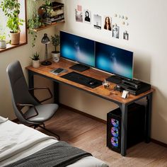 there is a desk with two monitors on it