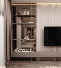 a living room with a large flat screen tv on top of a wooden entertainment center