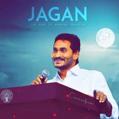 a man standing at a podium with a microphone in his hand and the words jagan written on it