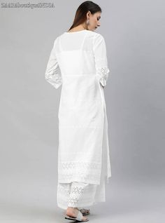 HAND CRAFTED KURTA SET DESCRIPTION *White embroidered kurta with palazzos *White embroidered straight calf length kurta, has a round neck, three-quarter sleeves, straight hem White embroidered palazzos, has partially elasticated waistband with slip on closure *Fabric:- Top fabric: Pure Cotton Bottom fabric: Pure Cotton *Wash Care:- Machine-wash AVAILABLE IN 6 SIZES THEY ARE IN FOLLOWING MEASUREMENTS IN INCHES:- XS:- Bust-34/Top Length-46/Bottom Waist-26/Bottom Length-38/Hip-38 S:- Bust-36/Top Le Elegant Cotton Dress With Cutwork Details, Fitted Cotton Dress With Cutwork Hem, Spring Cotton Dresses With Cutwork, Wedding Cotton Dress With Cutwork Details, Wedding Cotton Dress With Cutwork, Cotton Wedding Dress With Cutwork, Fitted Cotton Embroidered Dress With Chikankari, Fitted Cotton Dress With Chikankari Embroidery, White Cotton Sets With Embroidered Hem