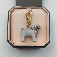 Please visit  for more products and promotions. Juicy Couture pug charm. No box is included! The box in photo is for display only! I did not keep all the charm boxes when I store them. Retired charm! Hard to find! I combine shipping. Note: Some charms I have for sale are reproduced from the original Juicy Couture factory, others are from my own collection in the past 10 years.  All Juicy Couture charms are all from the same factory no matter the reproduction ones or the ones were produced from 2 Juicy Couture Charms, Charm Bracelets, Juicy Couture, Accessory Gift, Jewelry Bracelets, The Past, Matter, Charm Bracelet, Electronic Accessories