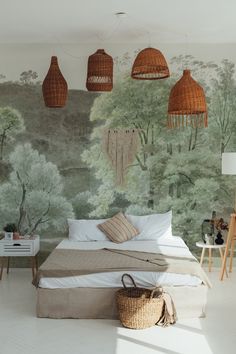 a bed sitting in a bedroom next to a wall covered in hanging lights and wicker baskets